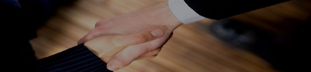 Real Estate Law Client Shaking Hands